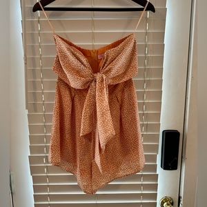 Women’s v neck romper with bow